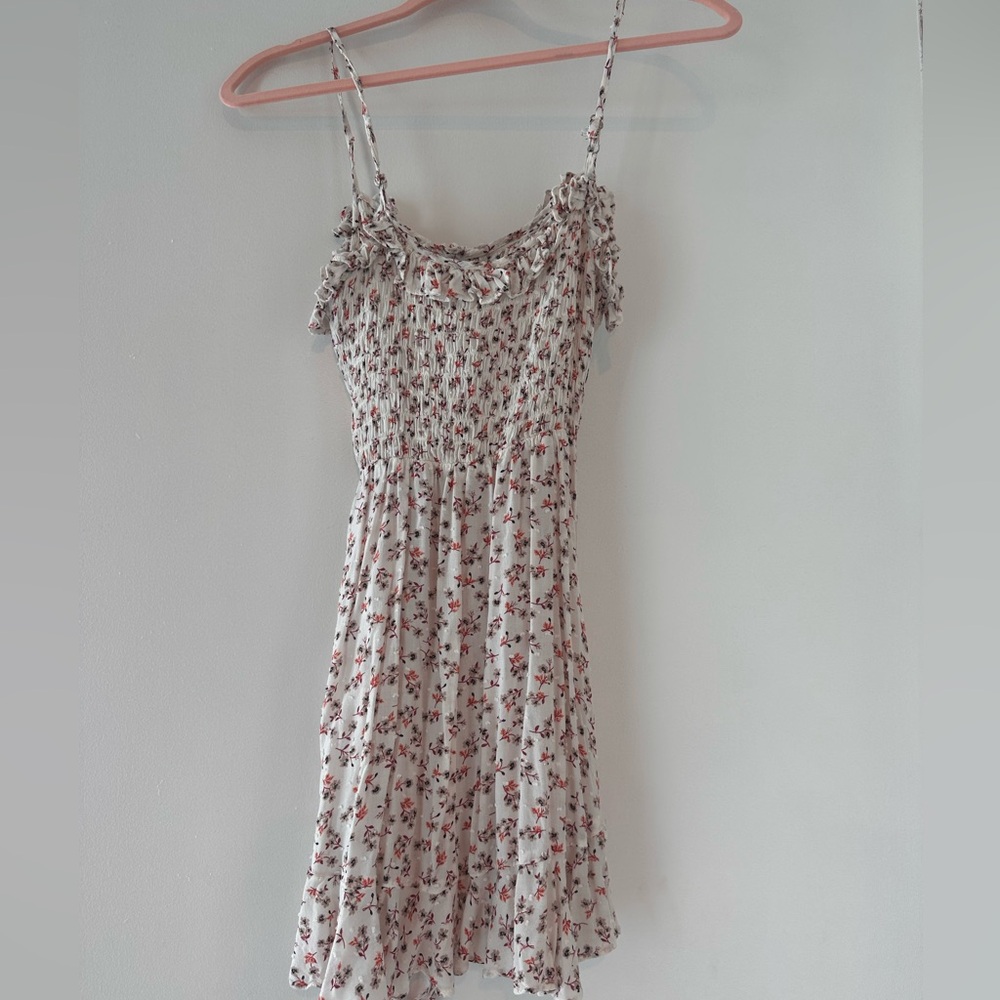 From a boutique in NYC a floral mini dress xs/s
